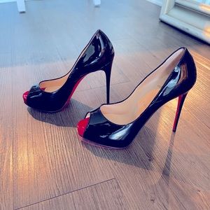 Peep toe Christian Louboutin heels.